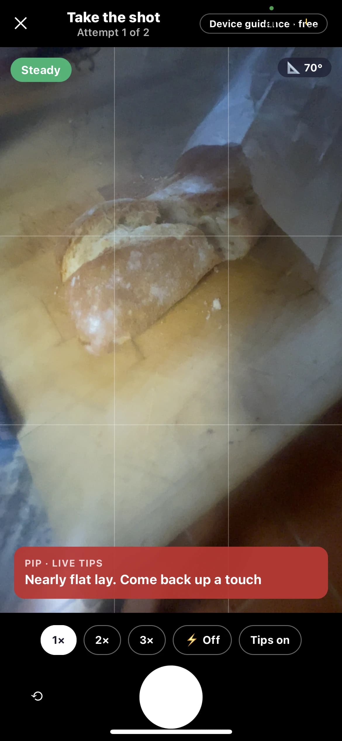 Pip Cam giving live angle and framing feedback while a team member photographs food